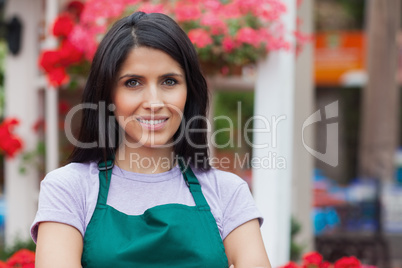 Smiling florist in garden centre