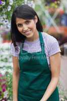 Smiling garden center worker