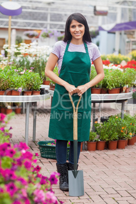 Florist holding a spade