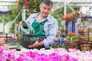 Florist watering flowers