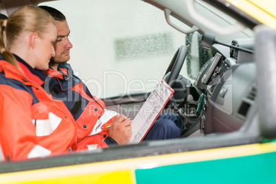 Emergency ambulance car paramedics sitting  work
