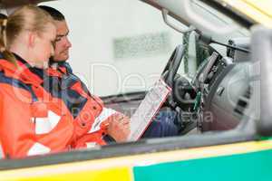 Emergency ambulance car paramedics sitting  work