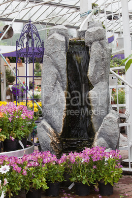 Artificial waterfall in garden center