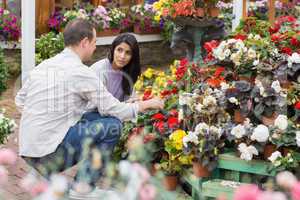 Couple discussing which flowers to buy