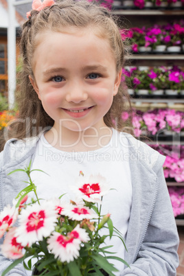 Child holding a flower