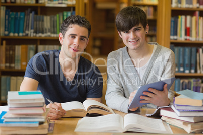 Young men looking up from studying