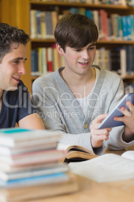 Men looking at tablet PC