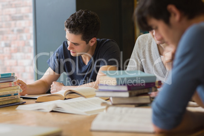 People sitting at the table doing homework