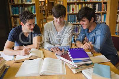 Young men looking at tablet PC