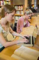 Woman at study desk using laptop