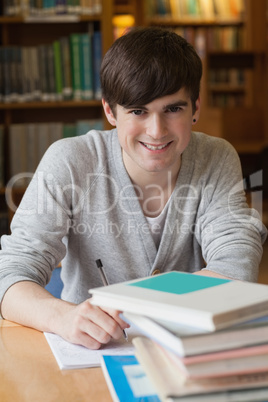 Man sitting at library desk