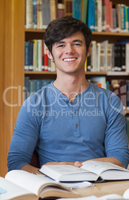 Man sitting at table at the library