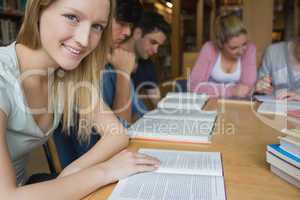 Smiling student with study group