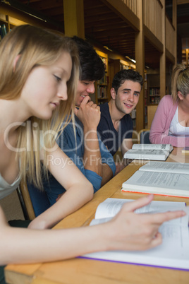 Students in the library in a study group