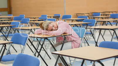 Woman napping in exam hall