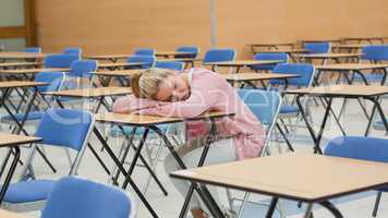 Woman napping in exam hall