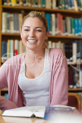 Student sitting at library desk