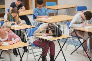 Girl sleeping during exam