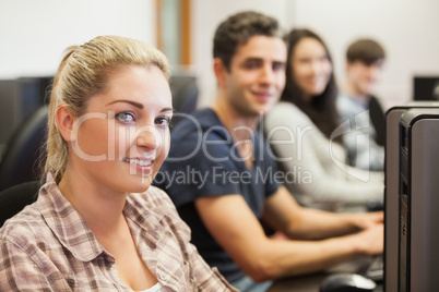 Students sitting at the computer room