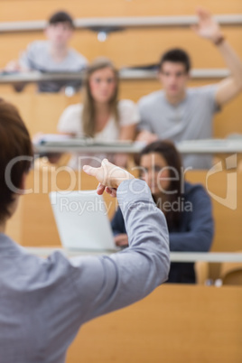 Teacher pointing to the man