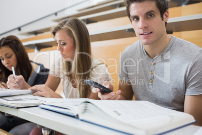 Students sitting at the desk learning