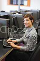 Teacher sitting at the computer