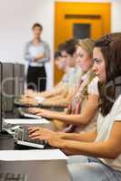 Student sitting at the computer concentrating