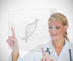 Woman looking at DNA helix interface