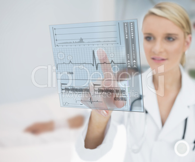 Doctor touching ECG interface