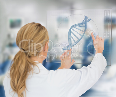 Woman using DNA helix interface Woman using DNA helix interface