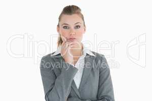 Businesswoman touching her cheek