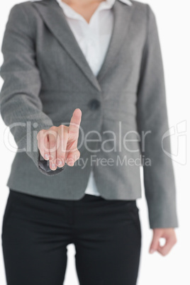 Businesswoman pointing at something