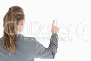 Businesswoman woman pointing from behind