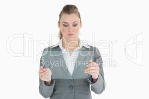 Businesswoman holding a glass slide