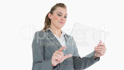 Businesswoman looking at pane