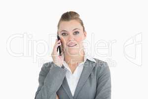 Happy businesswoman calling