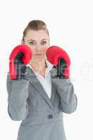 Businesswoman with boxing gloves