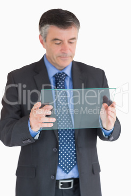 Businessman holding a glass slide