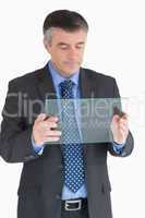 Businessman holding a glass slide