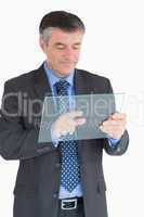 Businessman touching the pane