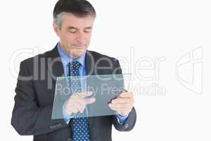 Businessman pressing something on pane