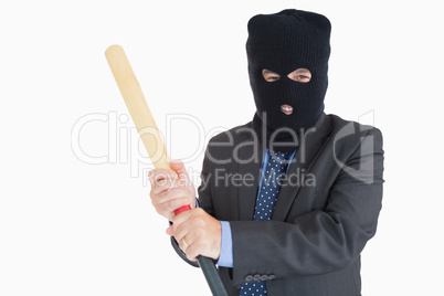 Smiling businessman dressing like a burglar