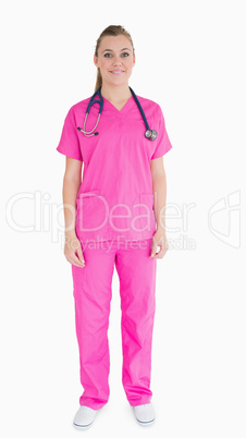 Nurse wearing pink scrubs