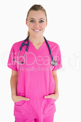 Happy doctor in pink scrubs