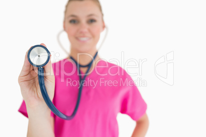 Woman holding a stethoscope