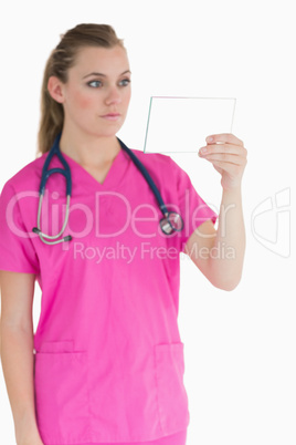 Female doctor viewing the glass slide