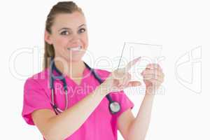 Female doctor touching glass slide