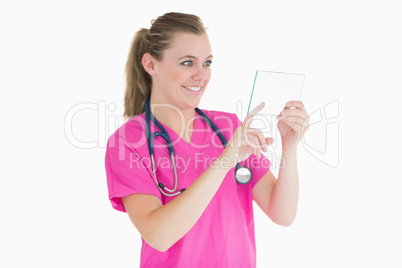 Doctor selecting something on clear pane