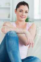 Woman sitting on a couch and relaxing