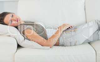 Woman lying on sofa and sleeping